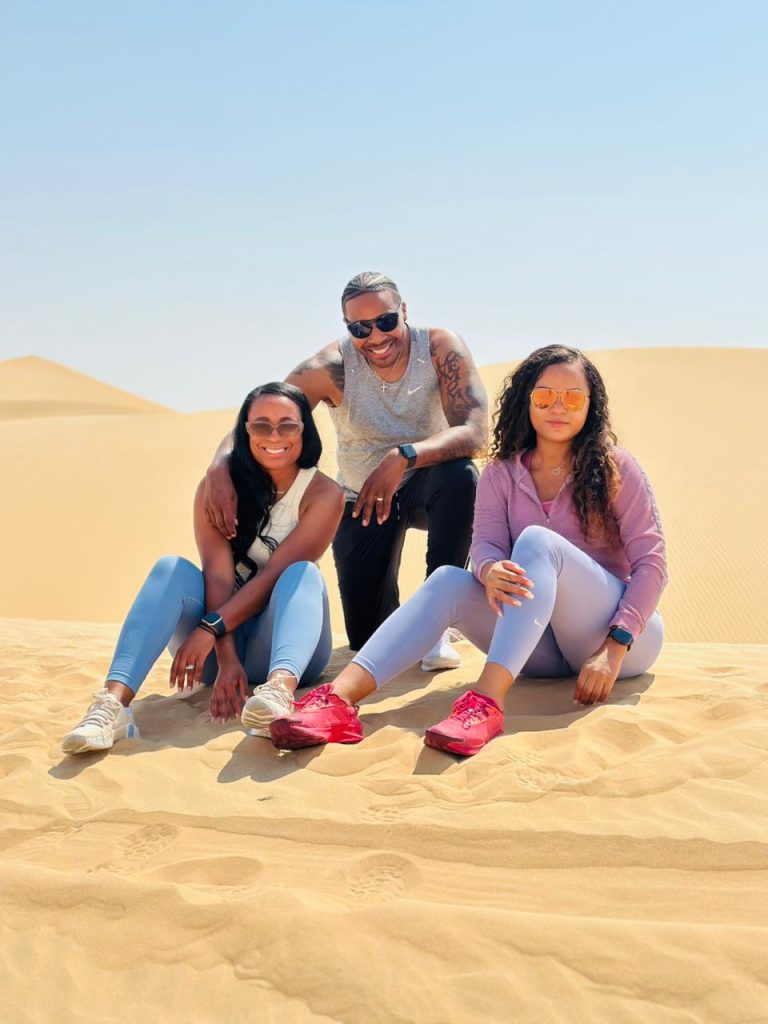 2female-1 male enjoying during desert safari Abu Dhabi