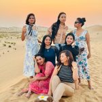 7 Girls enjoying and taking picture in Desert Safari trip in Abu Dhabi.